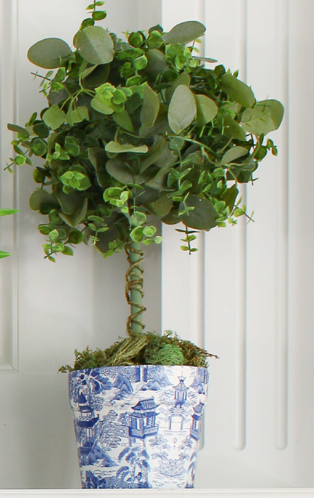 chinoiserie planter with greenery topiary