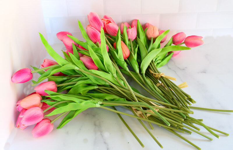 bunch of bright pink faux tulips