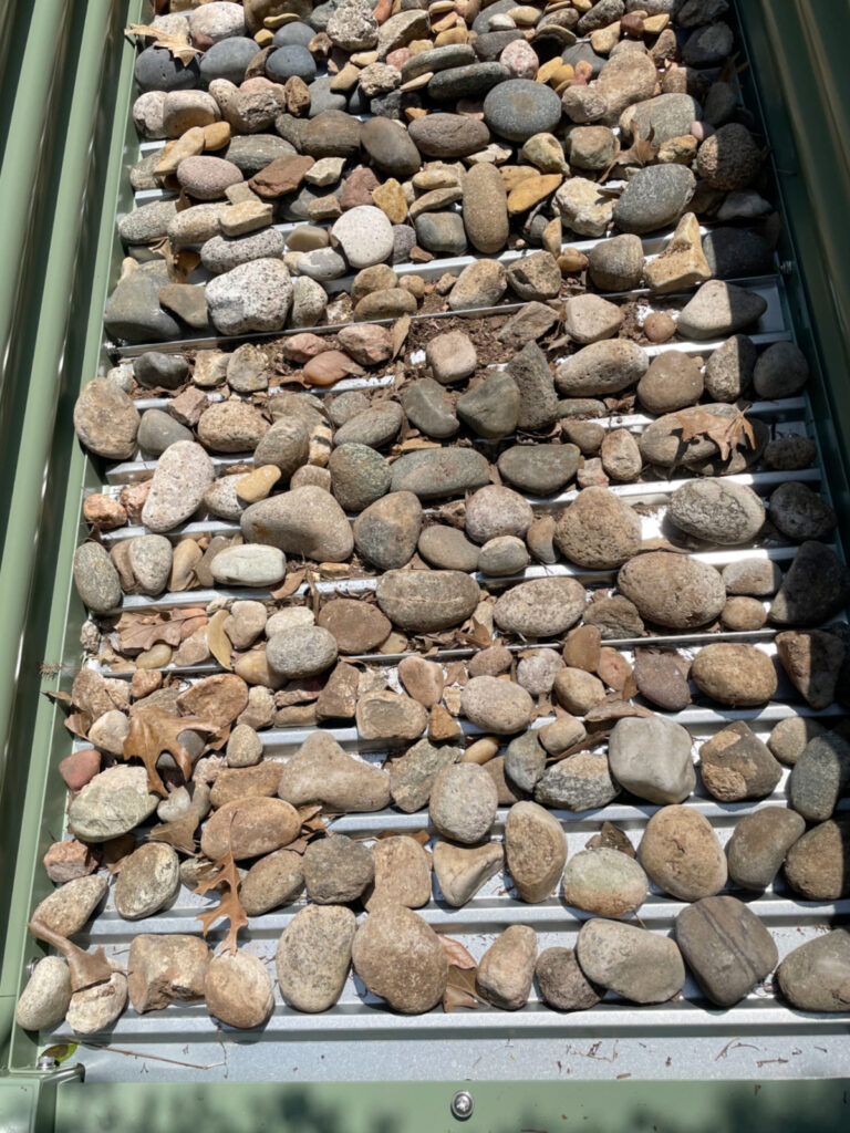garden bed with river rocks