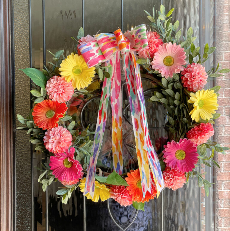 summer colorful flower wreath on front door