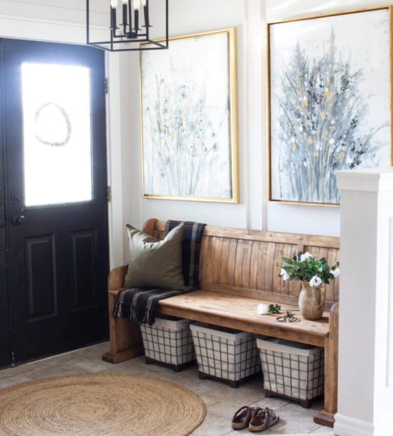 entry with bench and art work for summer home decor