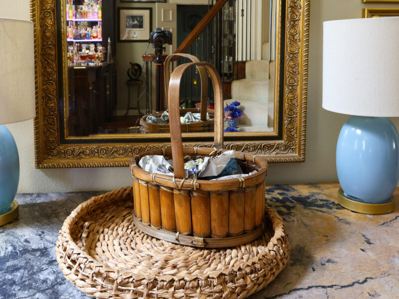 oval wood basket on woven tray
