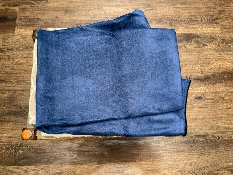 two blue fabrics, one soldi navy and one blue pattern