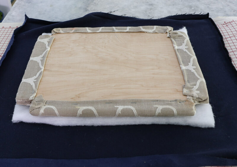 seat and batting on navy fabric