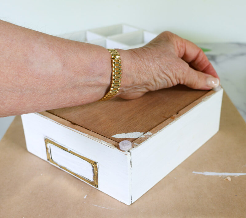 adding felt pads to wood box