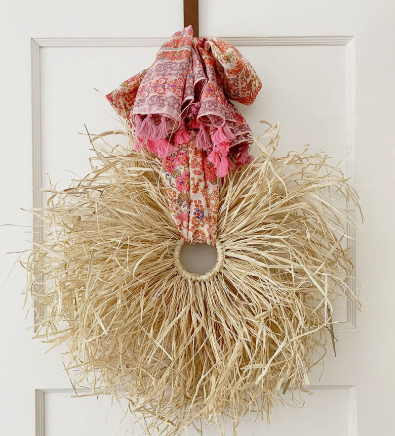 fall wreath with pink tassel bow