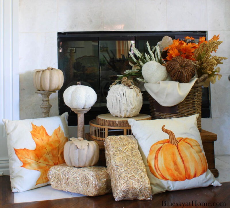 fall decor on fireplace hearth