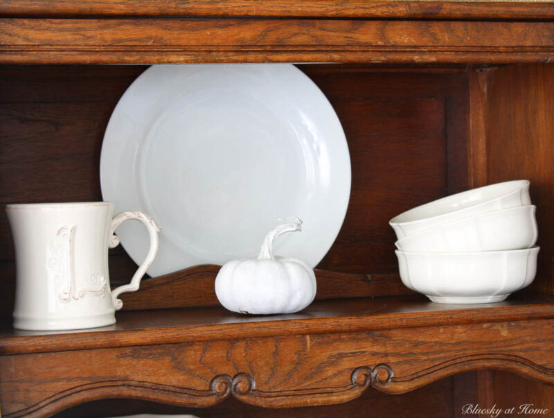 fall hutch decorating with white accessories