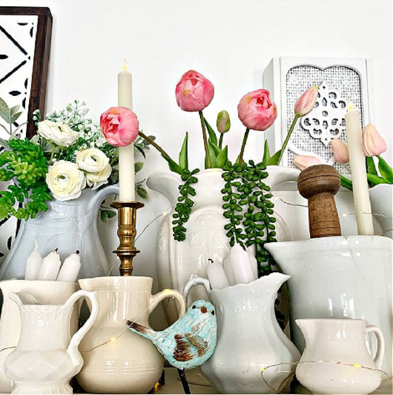 white vases with flowers