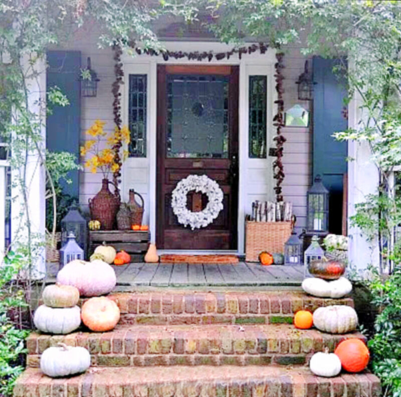 fall front porch with heirloom pumpkins