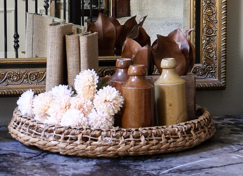 fall entry vignette with fall colors in caramel, brown, and cream