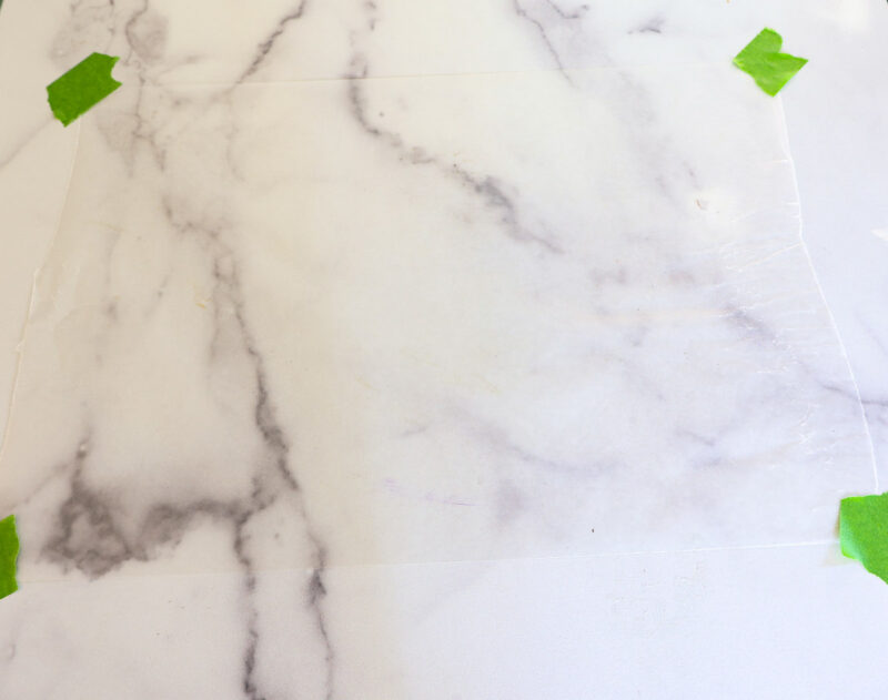 wax paper taped to work surface