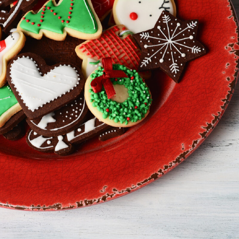 red plate of Christmas cookies