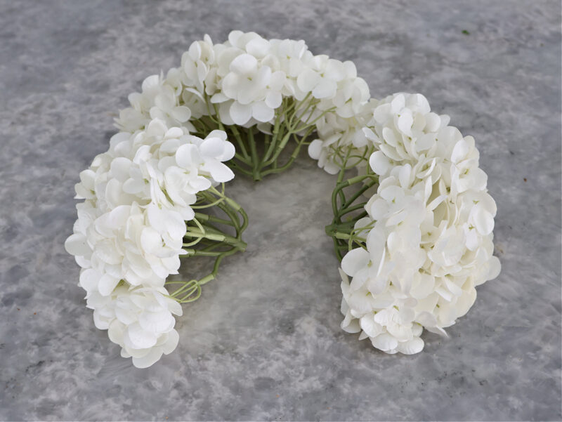 box of faux white hydrangeas