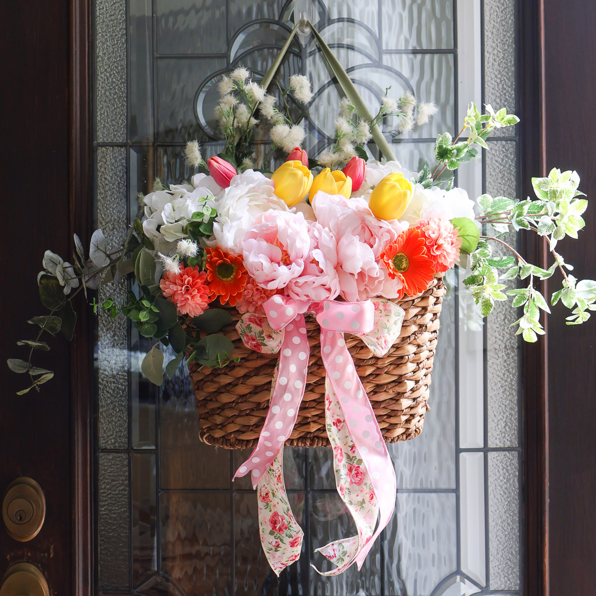 stunning front door flower basket with faux flowers