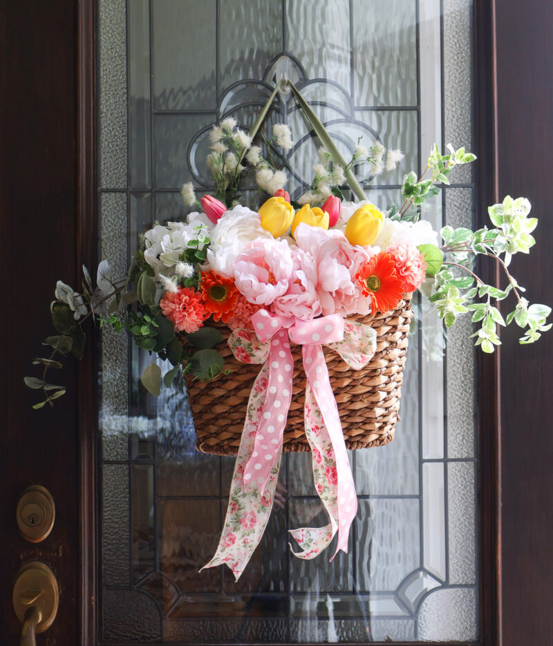 stunning front door flower basket with faux flowers