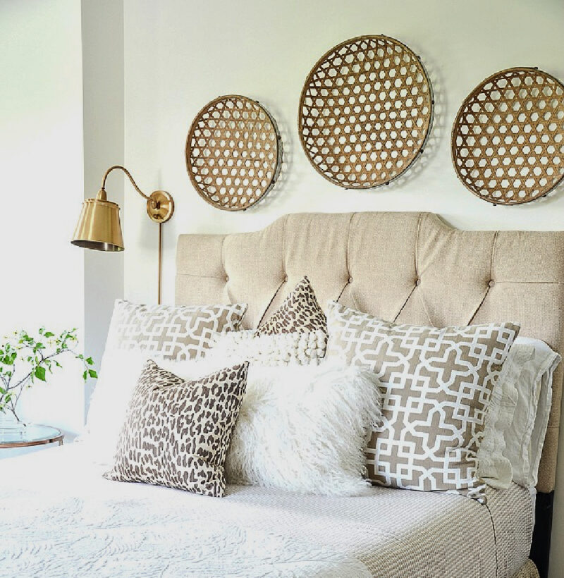 decorative pillows on a bed