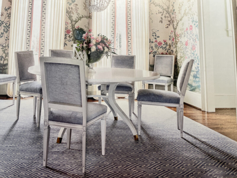 dining room with blue velvet chairs in Southern Home Magazine