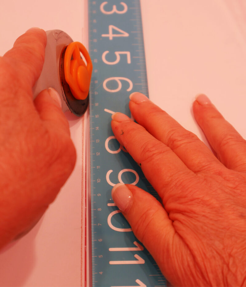 cutting paper liner with rotary cutter