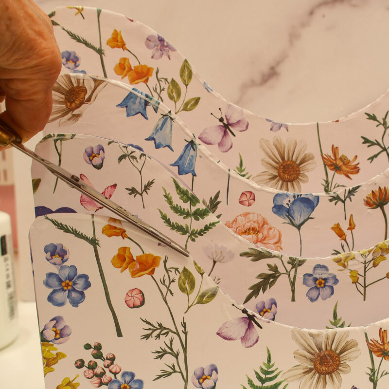 trimming paper on the file organizer