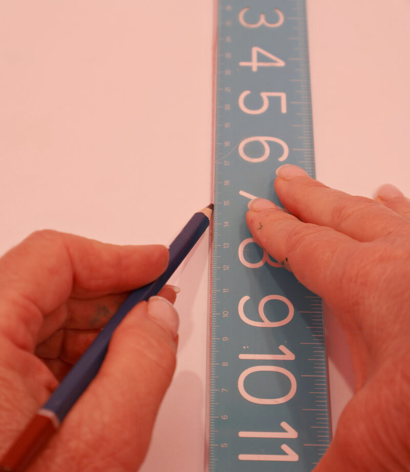 measuring sides of file organizer