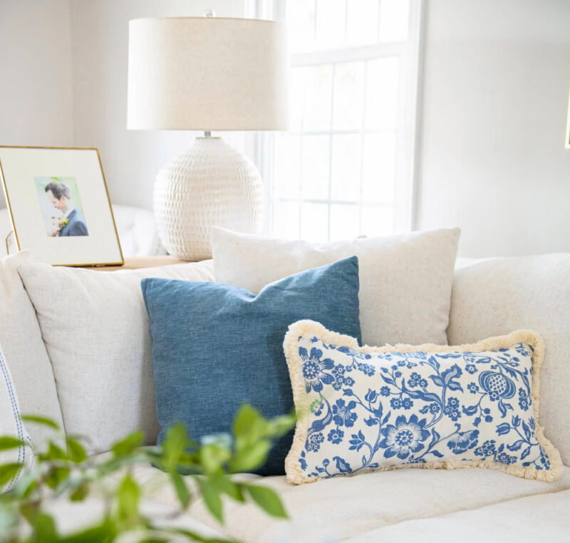 blue decorative pillows on sofa