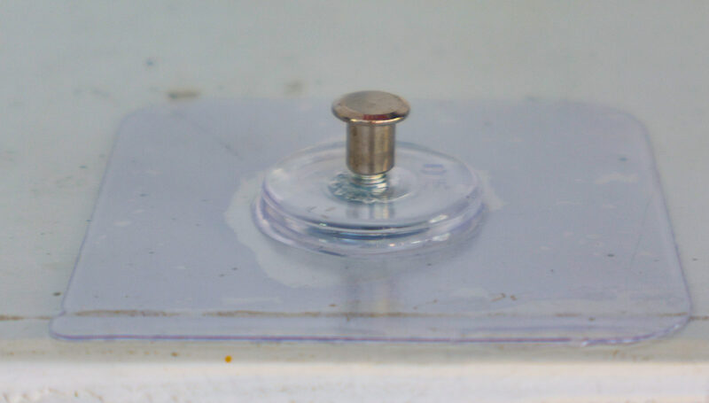adhesive nail hanger