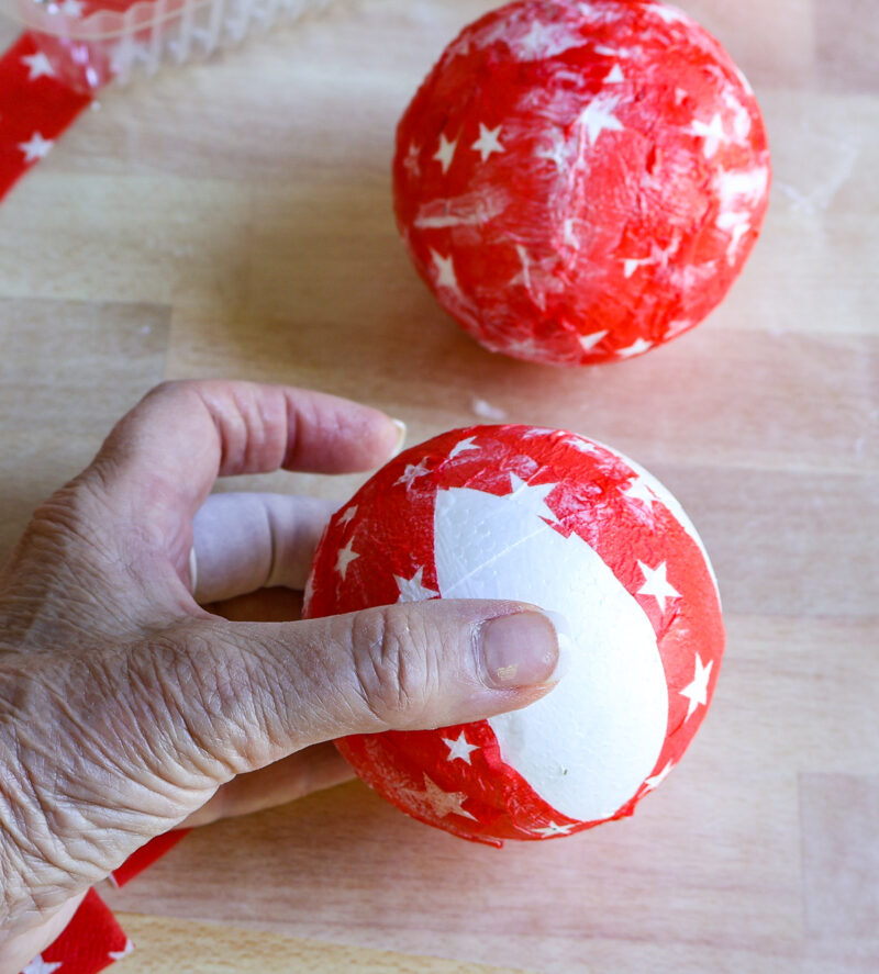 strips of napkin on the stryofoam ball