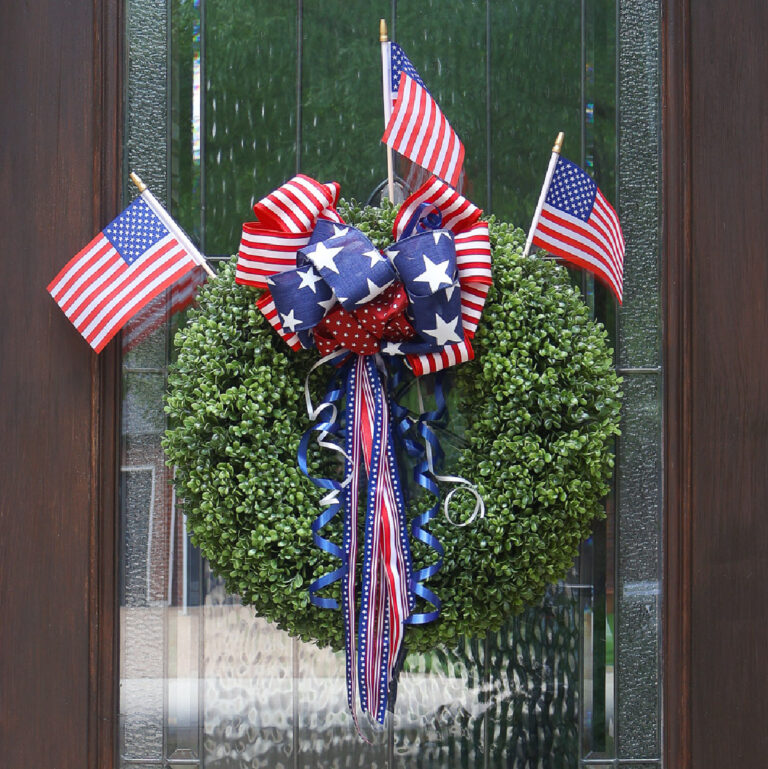 red, white, and blue 4th of July Wreath on front door