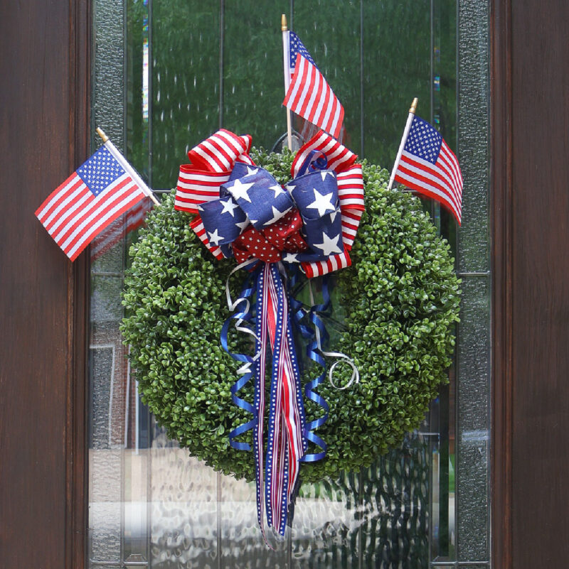red, white, and blue 4th of July Wreath on front door