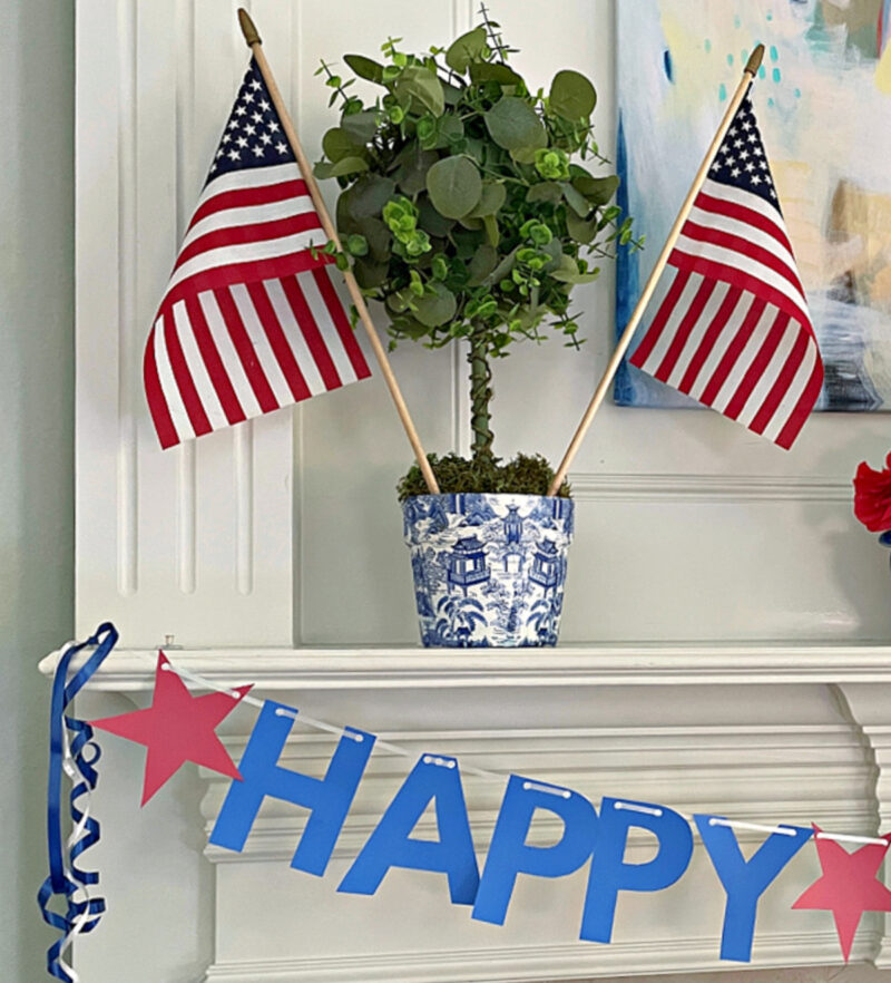 4th of July banner on living room mantel