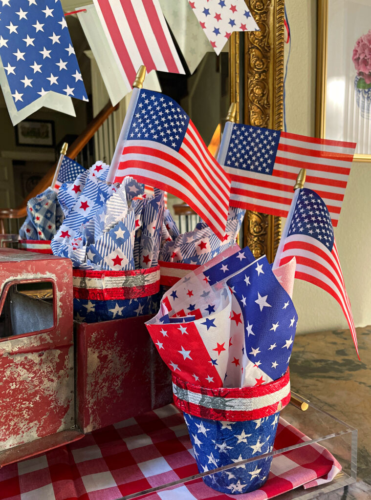 terra cotta pots with flags