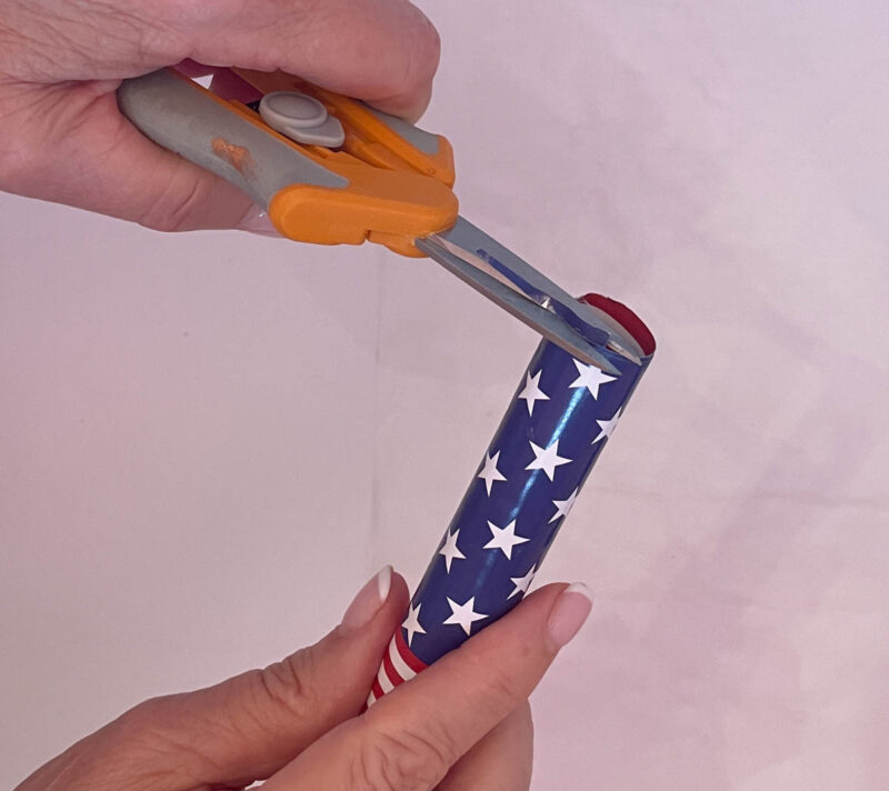 clipping excess paper off the firecracker