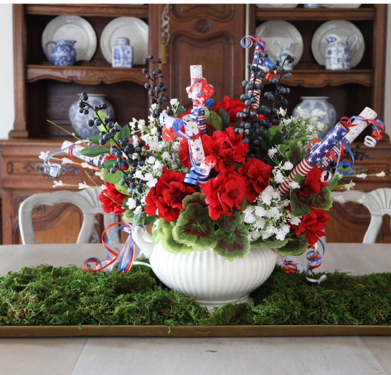 red, white, and blue 4th of July centerpiece with DIY firecrackers