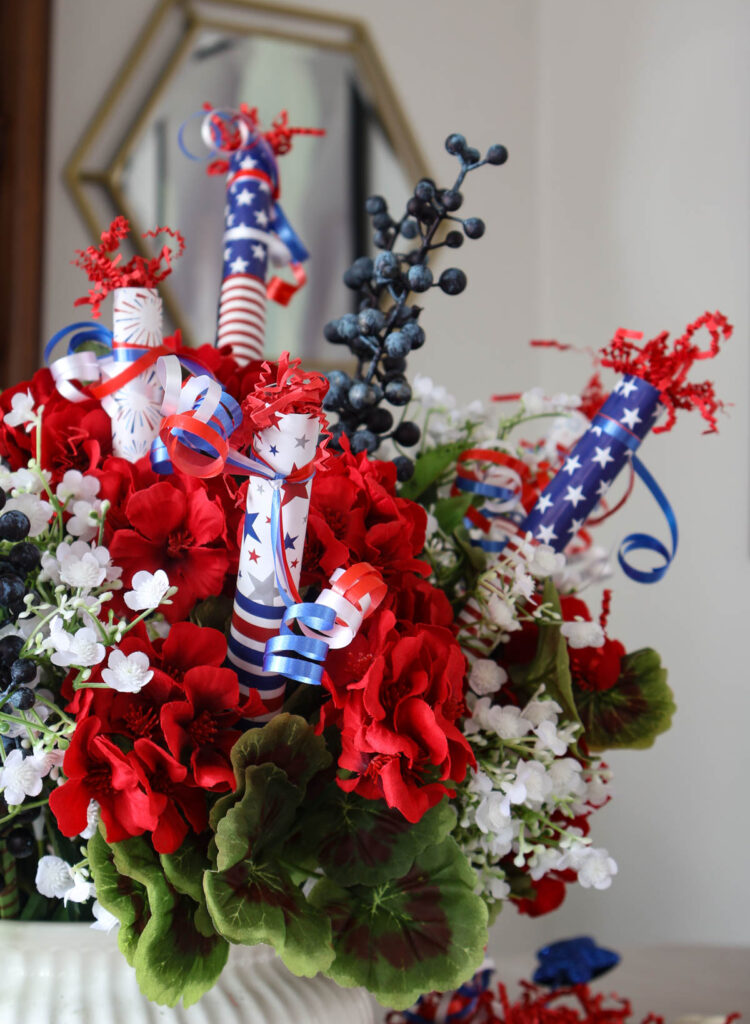 firecrackers and red, white, and blue flowers