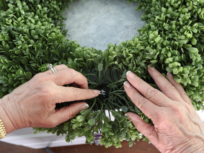 faux boxwood wreath showing clip
