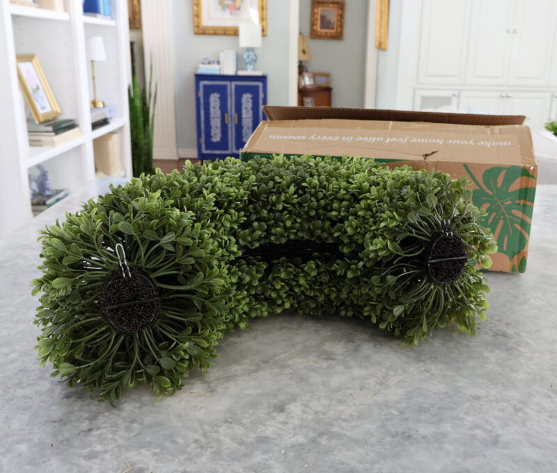 faux boxwood wreath folded