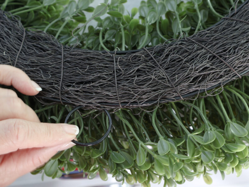 faux boxwood wreath with hanger on back