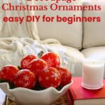 decoupage red white ornaments in white bowl on tray