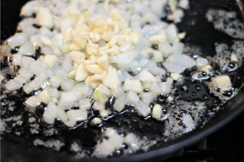 sauteing diced onion in cast iron skillet