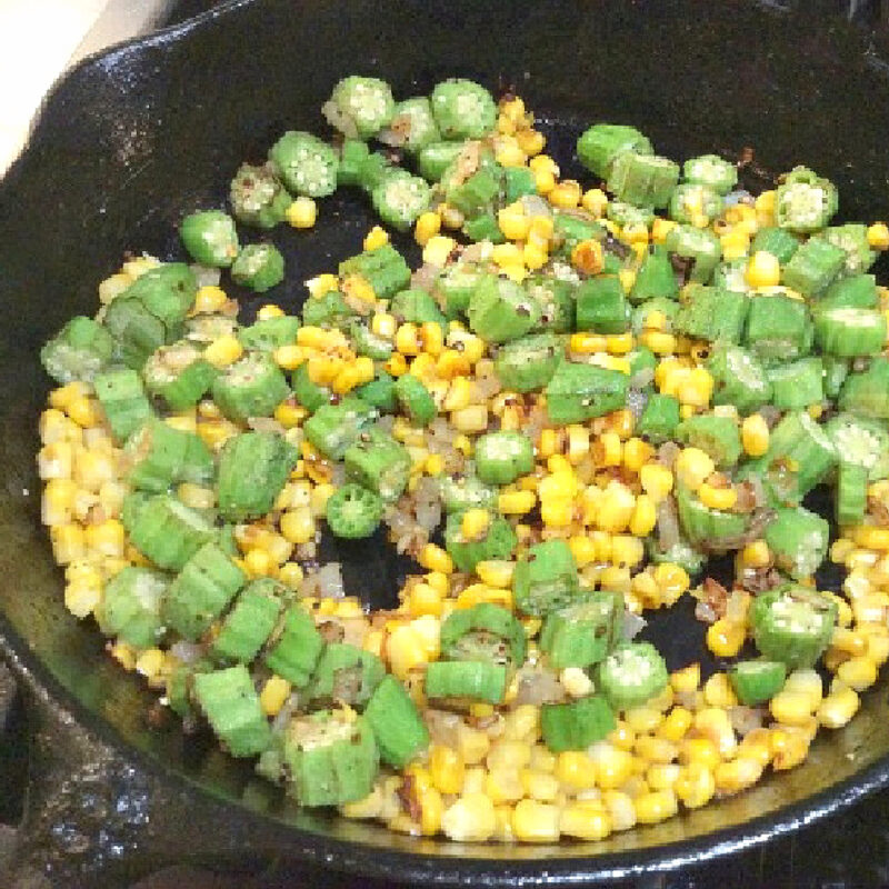 corn and okra in cast iron skillet