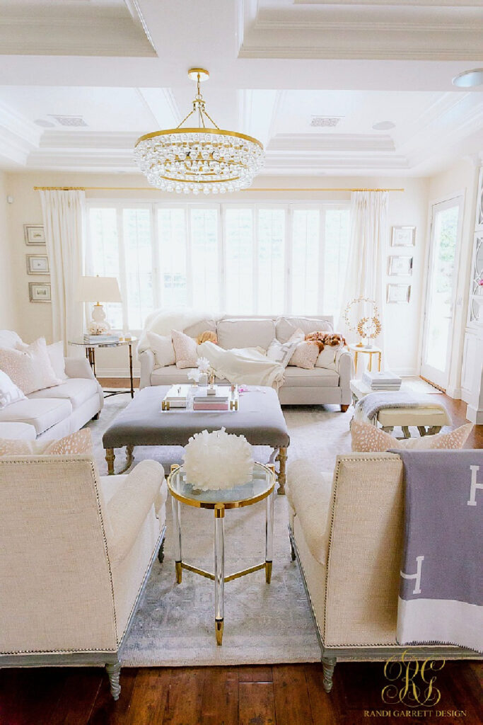 white living room with hints of pink