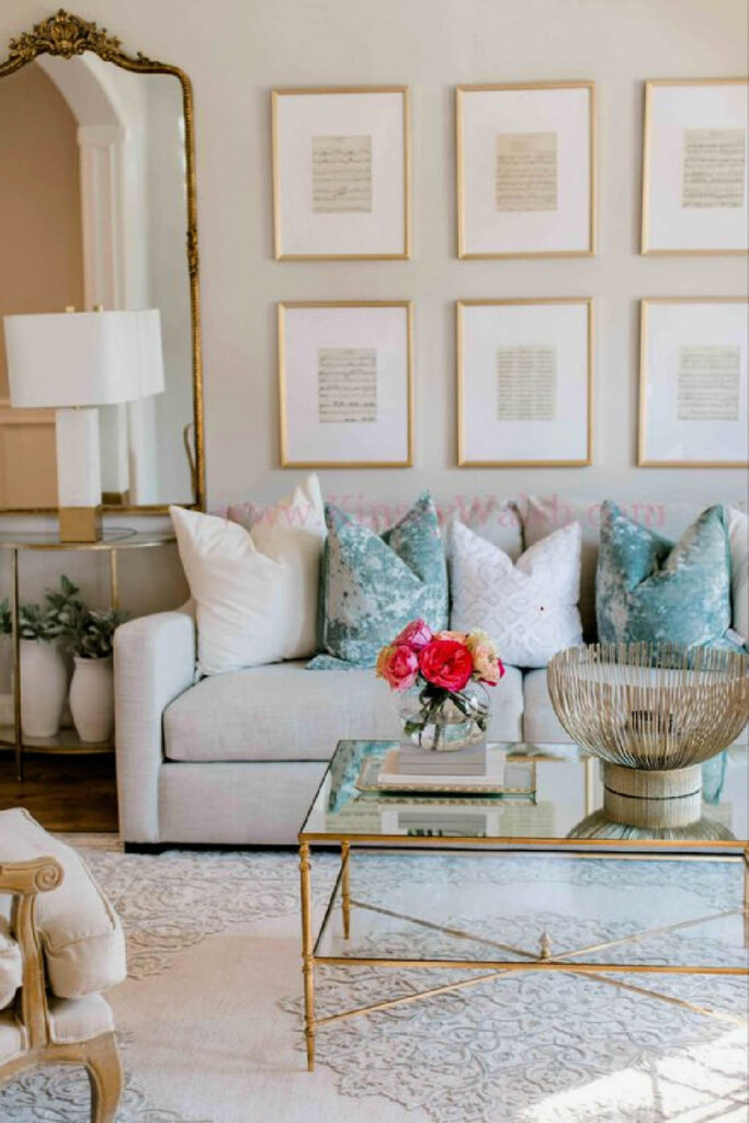 white living room with framed art