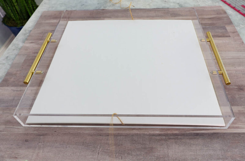 foam board fitted into bottom of acrylic tray