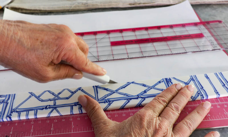 cutting wrapping paper away from side insert