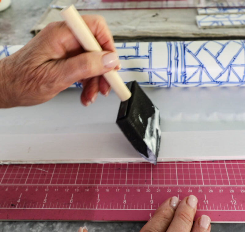 apply glue to one side of a side insert