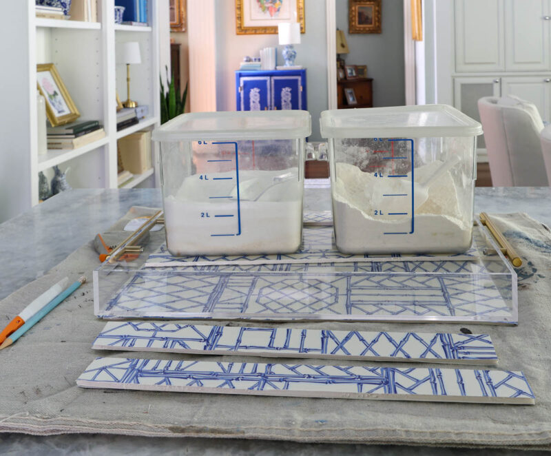 heavy containers on top of acrylic tray and inserts
