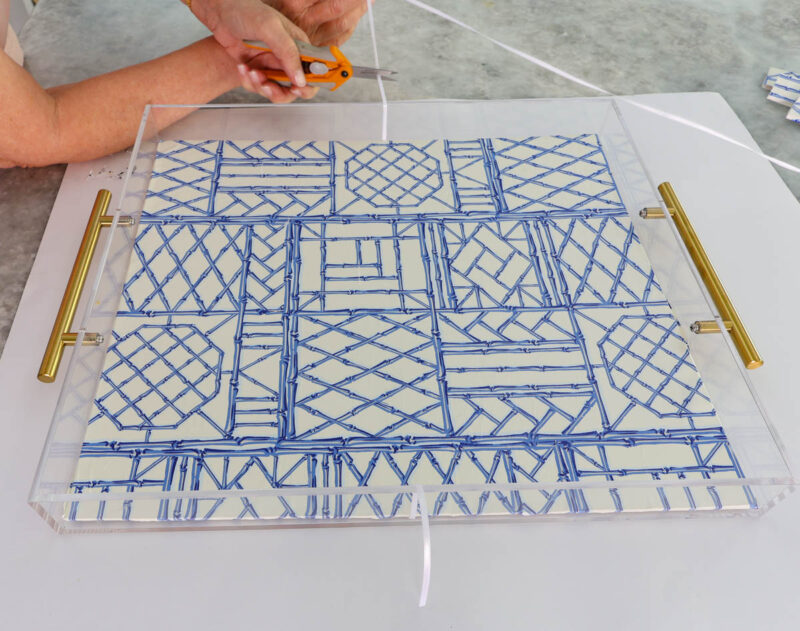 acrylic tray decorated with blue and white graphic design
