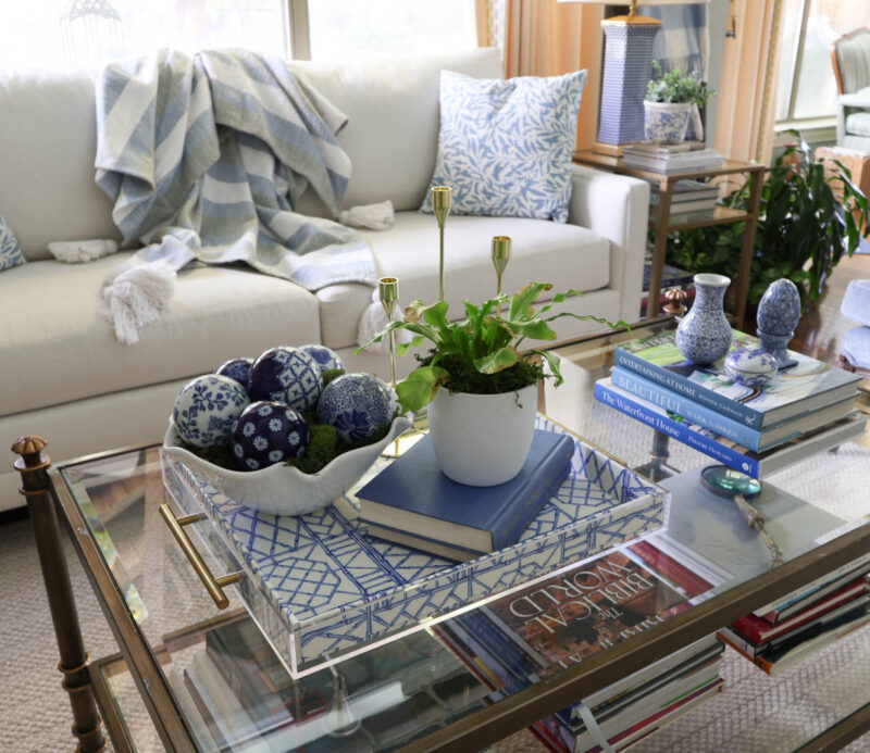 blue decorative acrylic tray on coffee table