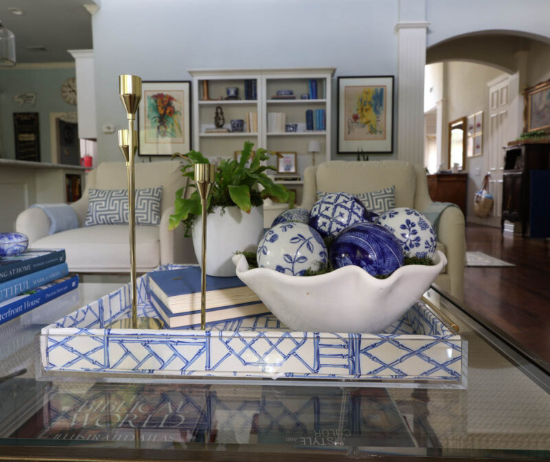 blue decorative acrylic tray on coffee table